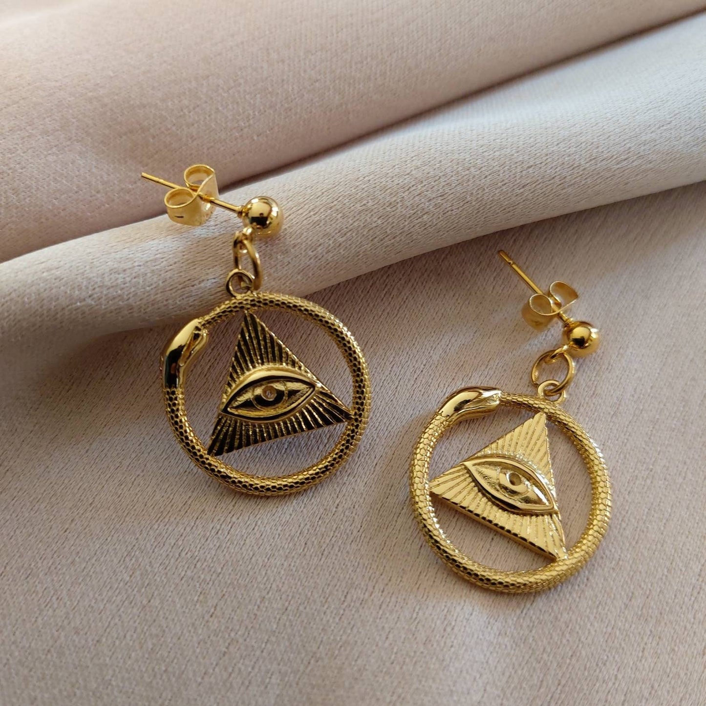 Gold snake earrings , ouroboros gold snake earrings , 3rd eye earrings , all seeing eye earrings , mystical earrings with all seeing eye